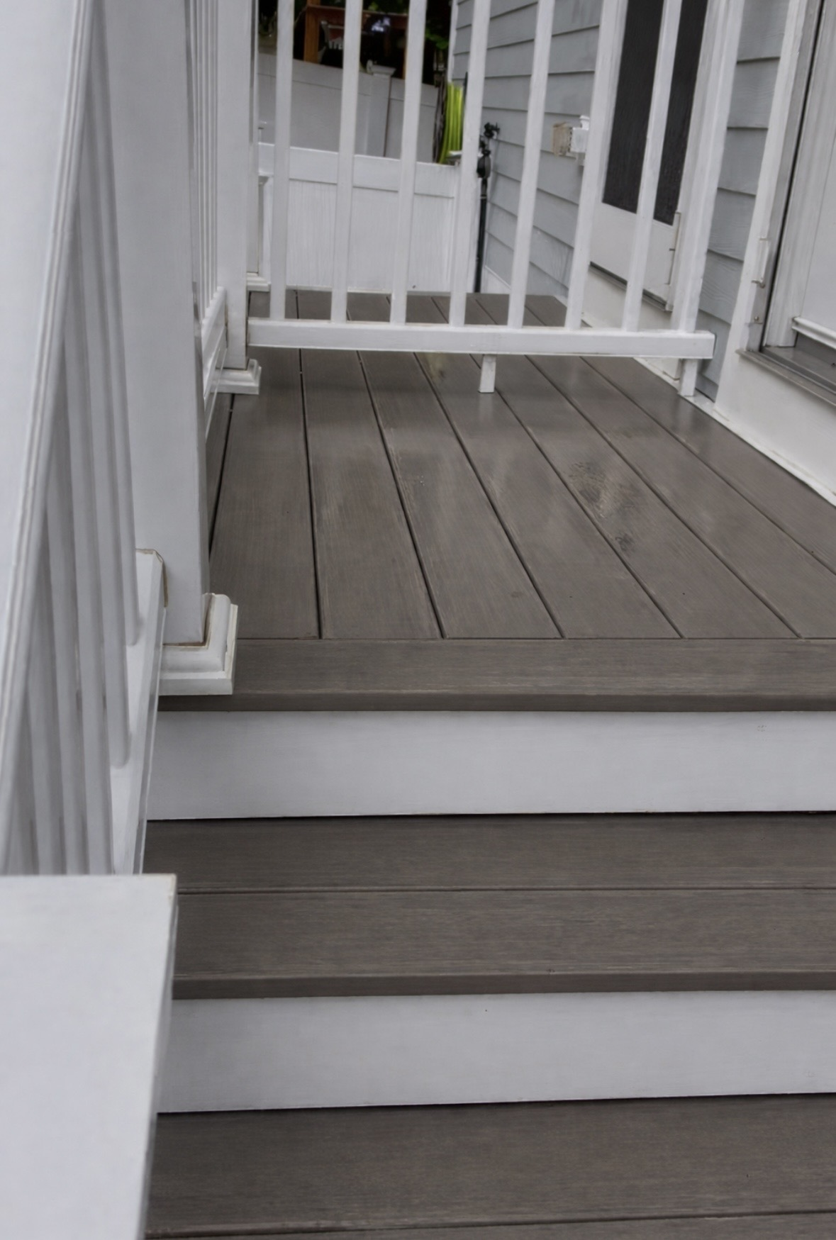Clean composite deck stairs after professional washing